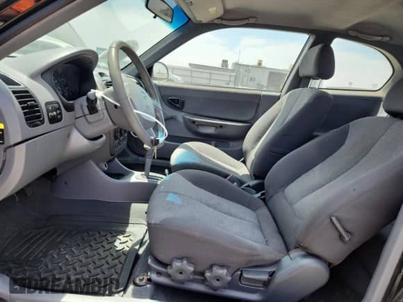 2003 Hyundai Accent GL с VIN KMHCG35C33U258812, выставлен на аукционе Copart как лот 57509245 с пробегом 153 716 миль миль и Списание • Salvage title. История ставок и продаж доступна на DreamBid. Изображение 7.