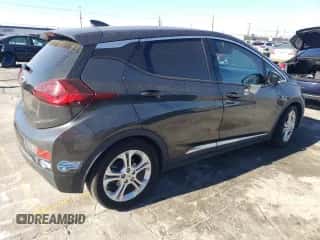 2020 Chevrolet Bolt EV LT z VIN 1G1FY6S08L4118077, wystawiony jako Copart lot #77114953 z przebiegiem 130 603 mil mil oraz . Historia ofert i sprzedaży dostępna na DreamBid. Obrazek 3.
