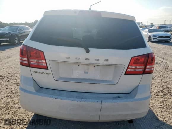 2014 Dodge Journey SE with VIN 3C4PDCAB8ET278076, listed as a Copart auction lot 67822225 with 177,076 mi miles and Salvage title. Bid and sale history available at DreamBid. Image 6.