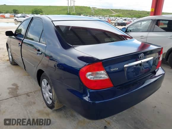 2002 Toyota Camry LE z VIN 4T1BE32K32U575209, wystawiony jako IAAI lot #43192866 z przebiegiem Nie podano mil oraz . Historia ofert i sprzedaży dostępna na DreamBid. Obrazek 3.