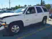 2003 Chevrolet Tahoe LS z VIN 1GNEC13T73R139140, wystawiony jako IAAI lot #43474168 z przebiegiem 269 196 mil mil oraz . Historia ofert i sprzedaży dostępna na DreamBid. Obrazek 2.