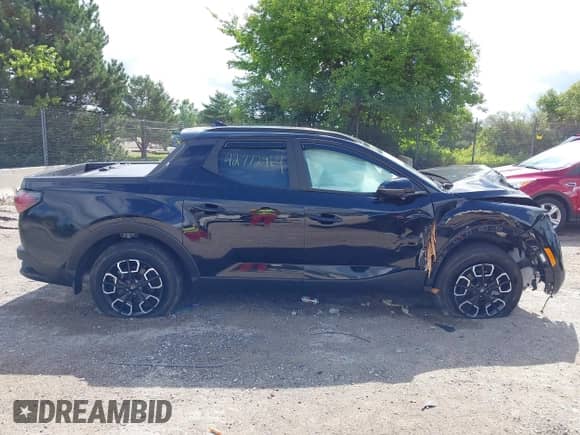 2023 Hyundai Santa Cruz SEL Premium with VIN 5NTJDDAF1PH065117, listed as a IAAI auction lot 42772964 with 9,626 mi miles and . Bid and sale history available at DreamBid. Image 13.