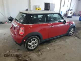 2013 MINI Hardtop with VIN WMWSU3C59DT687082, listed as a Copart auction lot 61967995 with 107,708 mi miles and Clean title. Bid and sale history available at DreamBid. Image 3.
