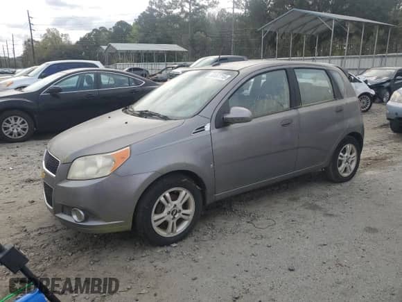 2009 Chevrolet Aveo 2LT with VIN KL1TG66E29B657115, listed as a Copart auction lot 50467715 with 124,489 mi miles and Clean title. Bid and sale history available at DreamBid. Image 1.