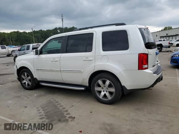 2014 Honda Pilot Touring with VIN 5FNYF3H92EB006641, listed as a Copart auction lot 69729915 with 162,386 mi miles and Salvage title. Bid and sale history available at DreamBid. Image 2.