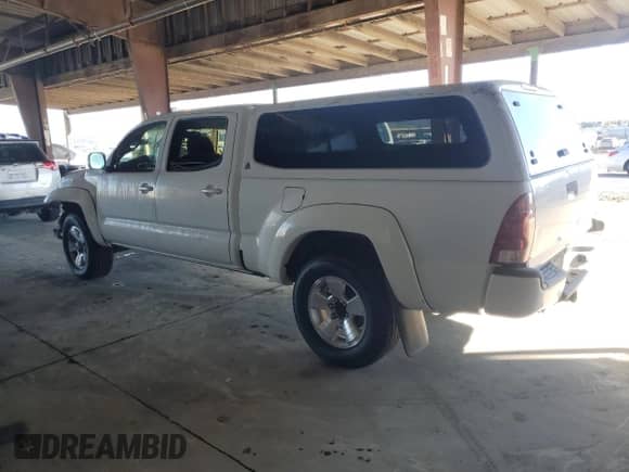 2007 Toyota Tacoma PreRunner z VIN 5TEKU72N17Z469350, wystawiony jako Copart lot #82575835 z przebiegiem 156 986 mil mil oraz Szkoda całkowita • Salvage title. Historia ofert i sprzedaży dostępna na DreamBid. Obrazek 2.