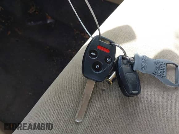 2008 Honda Accord LX-S with VIN 1HGCS12348A021235, listed as a IAAI auction lot 42331687 with 215,595 mi miles and . Bid and sale history available at DreamBid. Image 11.