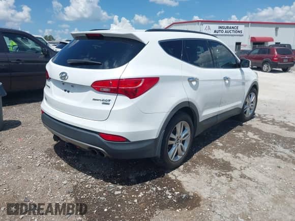 2013 Hyundai Santa Fe Sport with VIN 5XYZUDLA3DG054402, listed as a IAAI auction lot 42863309 with 133,453 mi miles and . Bid and sale history available at DreamBid. Image 4.
