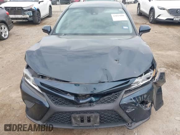 2020 Toyota Camry SE with VIN 4T1G11AK4LU955992, listed as a IAAI auction lot 43027088 with 77,002 mi miles and . Bid and sale history available at DreamBid. Image 6.