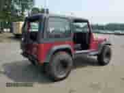 1998 Jeep Wrangler SE z VIN 1J4FY29P8WP714385, wystawiony jako Copart lot #67436145 z przebiegiem 167 827 mil mil oraz Szkoda całkowita • Salvage title. Historia ofert i sprzedaży dostępna na DreamBid. Obrazek 3.