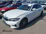 2019 BMW 3 Series 330i with VIN WBA5R1C55KAK06367, listed as a IAAI auction lot 43210794 with 125,760 mi miles and . Bid and sale history available at DreamBid. Image 2.