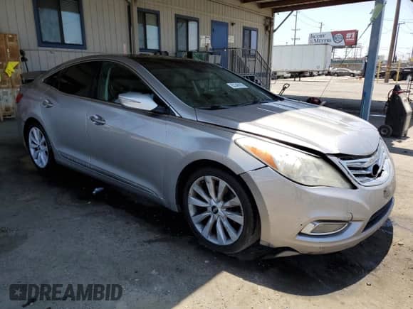 2012 Hyundai Azera с VIN KMHFH4JG8CA191831, выставлен на аукционе Copart как лот 63348985 с пробегом 189 389 миль миль и Списание • Salvage title. История ставок и продаж доступна на DreamBid. Изображение 4.