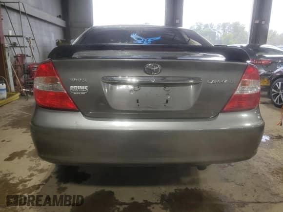 2003 Toyota Camry LE с VIN 4T1BF32K33U548784, выставлен на аукционе Copart как лот 85709875 с пробегом 175 340 миль миль и Списание • Salvage title. История ставок и продаж доступна на DreamBid. Изображение 6.