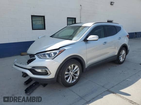 2018 Hyundai Santa Fe 2.0T z VIN 5XYZUDLA3JG536928, wystawiony jako Copart lot #64972905 z przebiegiem 58 297 mil mil oraz Szkoda całkowita • Salvage title. Historia ofert i sprzedaży dostępna na DreamBid. Obrazek 1.