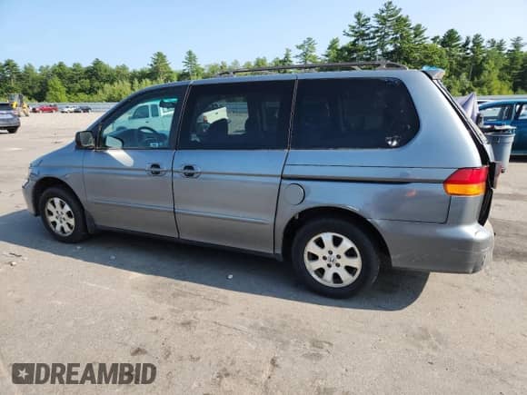 2002 Honda Odyssey LX with VIN 2HKRL18532H504584, listed as a Copart auction lot 67735975 with 230,708 mi miles and Salvage title. Bid and sale history available at DreamBid. Image 2.
