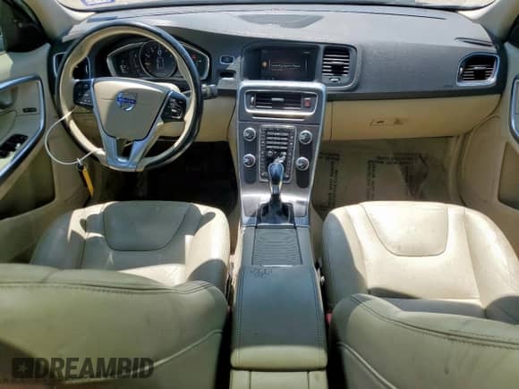 2015 Volvo S60 T5 Drive-E Platinum с VIN YV140MFM0F2336709, выставлен на аукционе Copart как лот 67614405 с пробегом 93 293 миль миль и Списание • Salvage title. История ставок и продаж доступна на DreamBid. Изображение 8.
