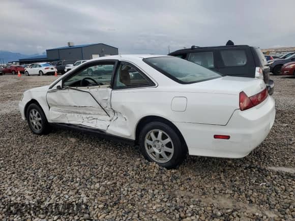 2002 Honda Accord with VIN 1HGCG32222A006616, listed as a Copart auction lot 76488464 with 184,143 mi miles and Salvage title. Bid and sale history available at DreamBid. Image 2.