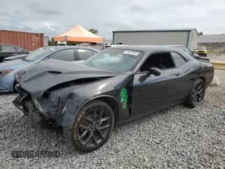 2023 Dodge Challenger SXT with VIN 2C3CDZAG3PH527851, listed as a Copart auction lot 68279835 with 34,450 mi miles and Salvage title. Bid and sale history available at DreamBid. Image 1.