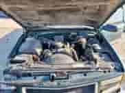 1996 GMC Sierra 1500 z VIN 2GTEC19R4T1552775, wystawiony jako Copart lot #68291925 z przebiegiem 146 095 mil mil oraz Szkoda całkowita • Salvage title. Historia ofert i sprzedaży dostępna na DreamBid. Obrazek 11.
