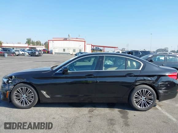 2019 BMW 5 Series 530i with VIN WBAJA5C58KWW09274, listed as a IAAI auction lot 43227065 with 97,443 mi miles and . Bid and sale history available at DreamBid. Image 14.