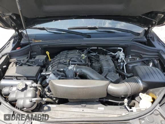 2023 Dodge Durango GT z VIN 1C4RDJDG9PC668381, wystawiony jako Copart lot #61684265 z przebiegiem Nie podano mil oraz Szkoda całkowita • Salvage title. Historia ofert i sprzedaży dostępna na DreamBid. Obrazek 12.