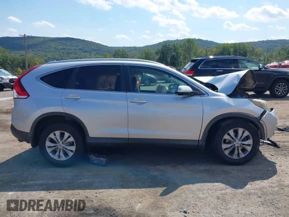2014 Honda CR-V EX-L with VIN 2HKRM4H74EH666471, listed as a IAAI auction lot 43148427 with 239,846 mi miles and . Bid and sale history available at DreamBid. Image 13.