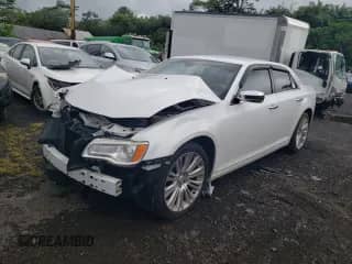 2013 Chrysler 300 C with VIN 2C3CCAET8DH529974, listed as a Copart auction lot 59144565 with 118,599 mi miles and Salvage title. Bid and sale history available at DreamBid. Image 1.