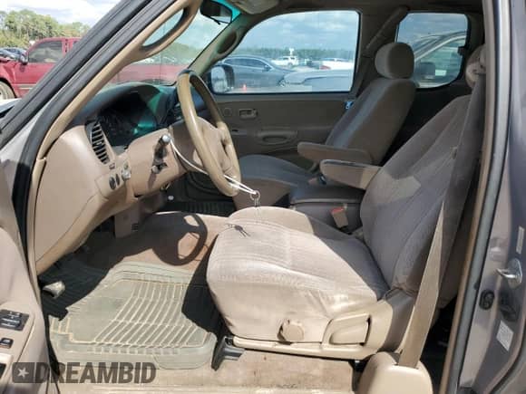 2002 Toyota Tundra SR5 z VIN 5TBRT34132S295977, wystawiony jako Copart lot #82577295 z przebiegiem 218 368 mil mil oraz Czysty tytuł • Clean title. Historia ofert i sprzedaży dostępna na DreamBid. Obrazek 7.