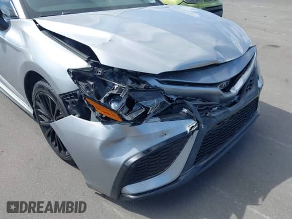 2021 Toyota Camry SE with VIN 4T1G11AK2MU445593, listed as a IAAI auction lot 43385464 with 57,907 mi miles and . Bid and sale history available at DreamBid. Image 6.