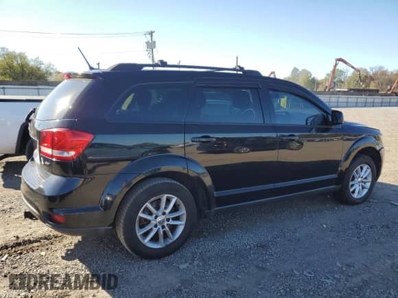 2014 Dodge Journey SXT with VIN 3C4PDCBB6ET174507, listed as a Copart auction lot 87109725 with 210,757 mi miles and Clean title. Bid and sale history available at DreamBid. Image 3.
