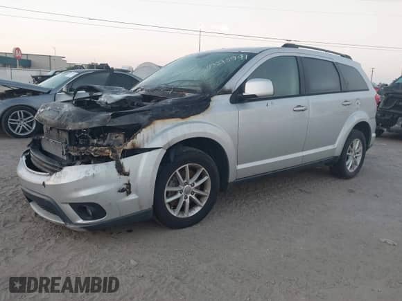2014 Dodge Journey SXT with VIN 3C4PDCBGXET187188, listed as a IAAI auction lot 43275941 with Not provided miles and . Bid and sale history available at DreamBid. Image 2.