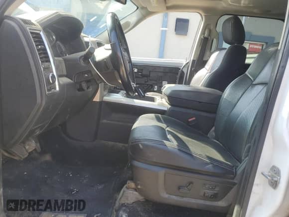 2018 Ram 1500 Laramie z VIN 1C6RR7NT9JS146161, wystawiony jako Copart lot #69370015 z przebiegiem 156 250 mil mil oraz Szkoda całkowita • Salvage title. Historia ofert i sprzedaży dostępna na DreamBid. Obrazek 7.