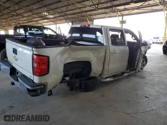 2015 Chevrolet Silverado 1500 LT z VIN 3GCPCREC1FG408914, wystawiony jako Copart lot #63656815 z przebiegiem Nie podano mil oraz Szkoda całkowita • Salvage title. Historia ofert i sprzedaży dostępna na DreamBid. Obrazek 3.