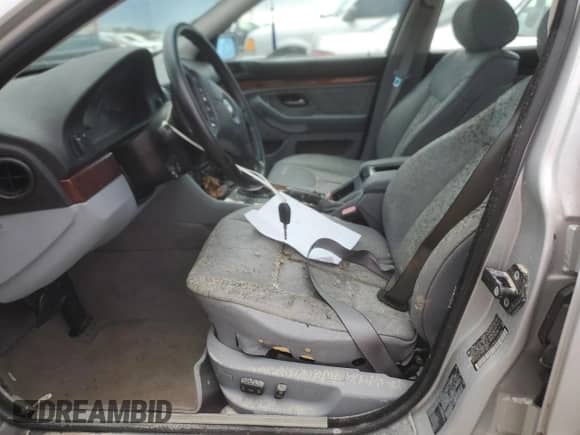 1999 BMW 5 Series 528i с VIN WBADM6332XBY30585, выставлен на аукционе Copart как лот 74830704 с пробегом Не указан миль и Списание • Salvage title. История ставок и продаж доступна на DreamBid. Изображение 7.