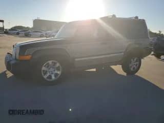 2007 Jeep Commander Limited z VIN 1J8HG58217C591460, wystawiony jako Copart lot #44587295 z przebiegiem 246 933 mil mil oraz Szkoda całkowita • Salvage title. Historia ofert i sprzedaży dostępna na DreamBid. Obrazek 1.