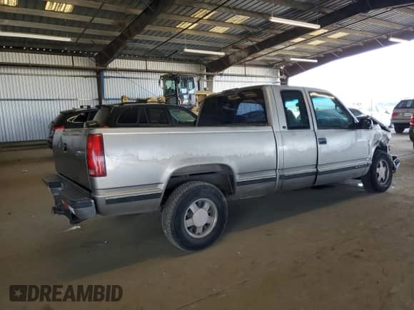 1999 Chevrolet Silverado 1500 with VIN 1GCEC19R1XR147244, listed as a Copart auction lot 48353905 with 264,369 mi miles and Salvage title. Bid and sale history available at DreamBid. Image 3.