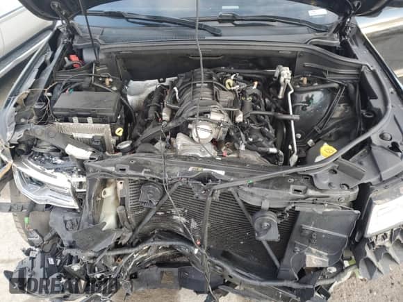 2018 Jeep Grand Cherokee Summit with VIN 1C4RJFJT2JC390079, listed as a Copart auction lot 43502555 with 106,724 mi miles and Salvage title. Bid and sale history available at DreamBid. Image 12.