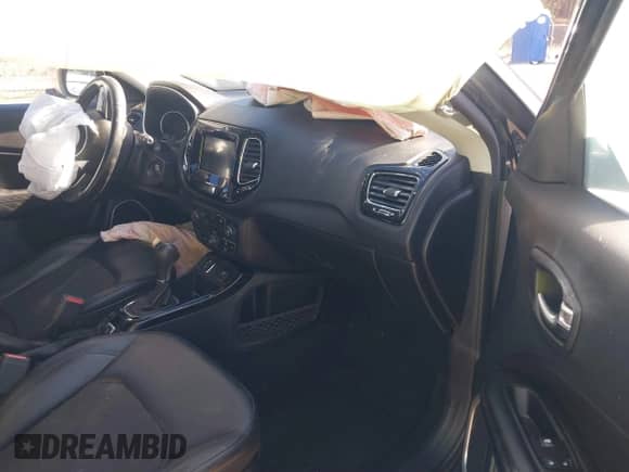 2020 Jeep Compass Latitude with VIN 3C4NJCBB8LT141103, listed as a IAAI auction lot 41263757 with 128,272 mi miles and . Bid and sale history available at DreamBid. Image 5.