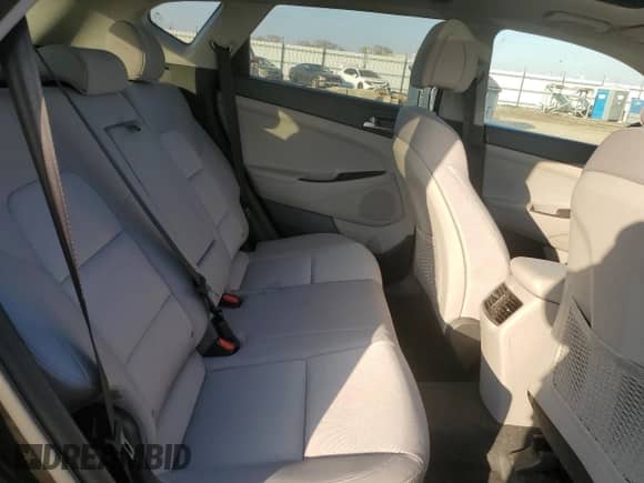 2017 Hyundai Tucson Value z VIN KM8J3CA25HU572940, wystawiony jako Copart lot #87414304 z przebiegiem 56 854 mil mil oraz Szkoda całkowita • Salvage title. Historia ofert i sprzedaży dostępna na DreamBid. Obrazek 11.