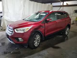 2017 Ford Escape Titanium с VIN 1FMCU9JD4HUB98248, выставлен на аукционе Copart как лот 86125025 с пробегом 101 590 миль миль и Списание • Salvage title. История ставок и продаж доступна на DreamBid. Изображение 1.
