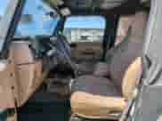 2002 Jeep Wrangler X z VIN 1J4FA39S22P776339, wystawiony jako Copart lot #57907165 z przebiegiem 154 088 mil mil oraz Szkoda całkowita • Salvage title. Historia ofert i sprzedaży dostępna na DreamBid. Obrazek 7.