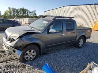 2005 Nissan Frontier Nismo with VIN 1N6AD07W35C443586, listed as a Copart auction lot 80103485 with 121,008 mi miles and Salvage title. Bid and sale history available at DreamBid. Image 1.
