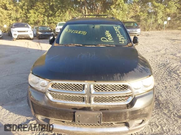 2013 Dodge Durango Crew with VIN 1C4RDJDG4DC659891, listed as a IAAI auction lot 43432858 with 211,933 mi miles and . Bid and sale history available at DreamBid. Image 12.
