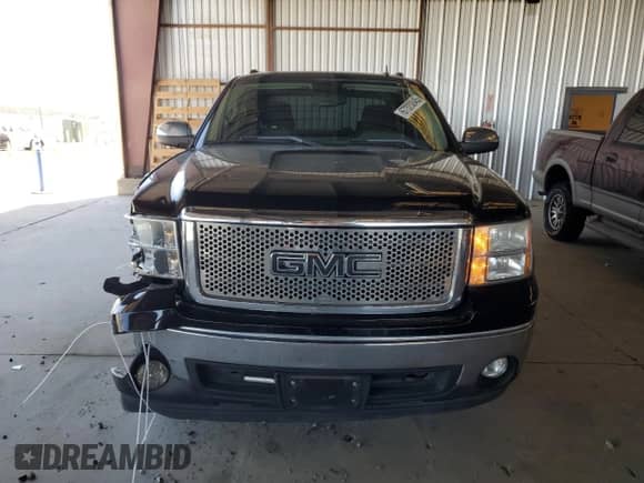2007 GMC Sierra 1500 SLE1 z VIN 2GTEC13C571726461, wystawiony jako Copart lot #67320845 z przebiegiem Nie podano mil oraz Szkoda całkowita • Salvage title. Historia ofert i sprzedaży dostępna na DreamBid. Obrazek 5.