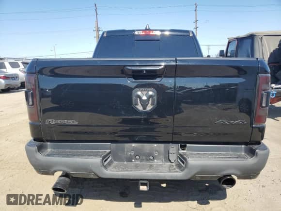 2020 Ram 1500 Rebel z VIN 1C6SRFLT0LN265734, wystawiony jako Copart lot #68314085 z przebiegiem 62 838 mil mil oraz Szkoda całkowita • Salvage title. Historia ofert i sprzedaży dostępna na DreamBid. Obrazek 6.