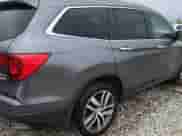 2017 Honda Pilot Touring с VIN 5FNYF6H90HB049168, выставлен на аукционе Copart как лот 69983165 с пробегом 124 467 миль миль и Списание • Salvage title. История ставок и продаж доступна на DreamBid. Изображение 13.