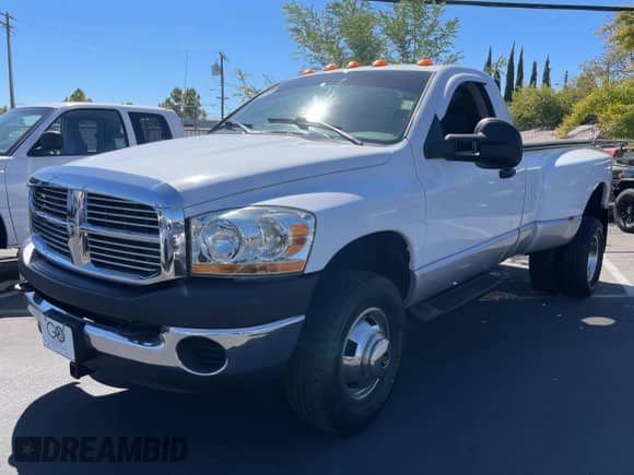 2006 Dodge RAM with VIN 3D7MX46C76G204357, listed as a Copart auction lot 73567364 with 106,166 mi miles and Salvage title. Bid and sale history available at DreamBid. Image 2.