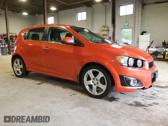 2012 Chevrolet Sonic с VIN 1G1JD6EH8C4120550, выставлен на аукционе Copart как лот 70987275 с пробегом 184 221 миль миль и Чистый • Clean title. История ставок и продаж доступна на DreamBid. Изображение 4.