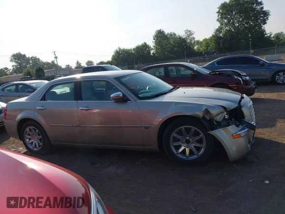 2006 Chrysler 300 C with VIN 2C3KA63H36H246141, listed as a IAAI auction lot 42797395 with 54,430 mi miles and . Bid and sale history available at DreamBid. Image 14.