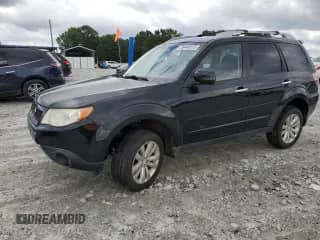 2011 Subaru Forester X Touring z VIN JF2SHAGC0BH716913, wystawiony jako Copart lot #58440075 z przebiegiem 208 726 mil mil oraz Szkoda całkowita • Salvage title. Historia ofert i sprzedaży dostępna na DreamBid. Obrazek 1.